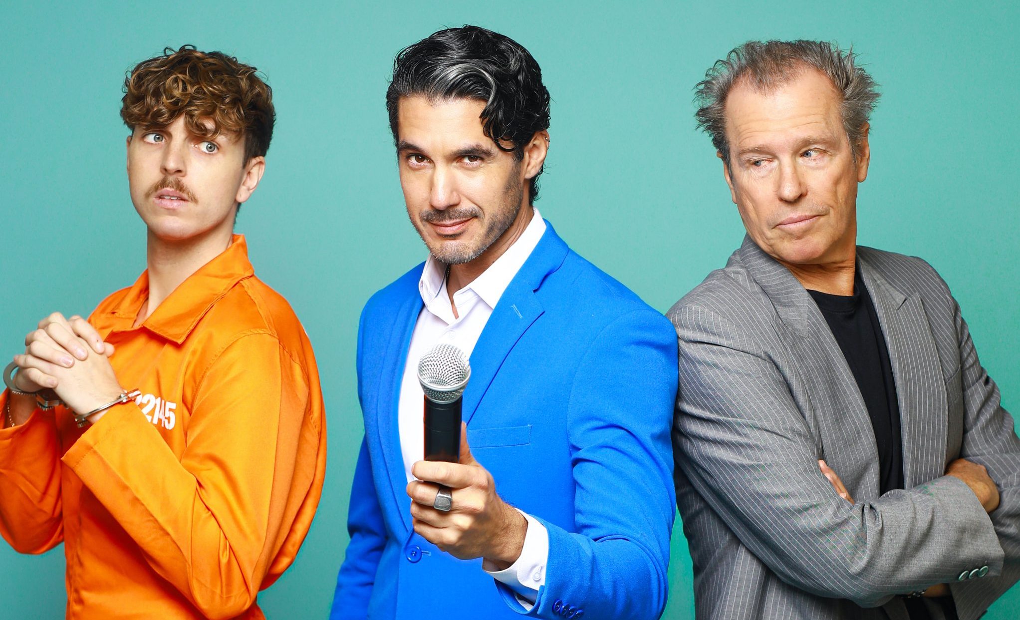 This is a promotional poster for "Daddy Issues: The Musical," running from January 23 to February 9 at the Madnani Theatre, 6760 Lexington Avenue. The image features three men posing against a teal background: one in an orange prison jumpsuit with handcuffs, another in a bright blue suit holding a microphone, and the third in a gray blazer with a skeptical expression.